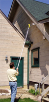 Dusting for carpenter bees without using the expensive dust stick or a ladder.